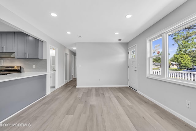 1624 Joffre Rd, Forked River, NJ 08731 - unfurnished living room featuring recessed lighting, light wood-style floors, and baseboards