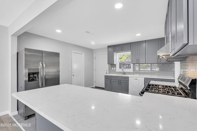 1624 Joffre Rd, Forked River, NJ 08731 - kitchen featuring appliances with stainless steel finishes, a sink, light stone counters, recessed lighting, and gray cabinets