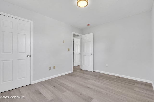 1624 Joffre Rd, Forked River, NJ 08731 - unfurnished bedroom featuring wood finished floors and baseboards