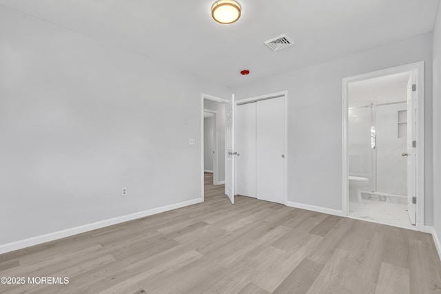 1624 Joffre Rd, Forked River, NJ 08731 - unfurnished bedroom with light wood-type flooring, a closet, baseboards, and ensuite bathroom
