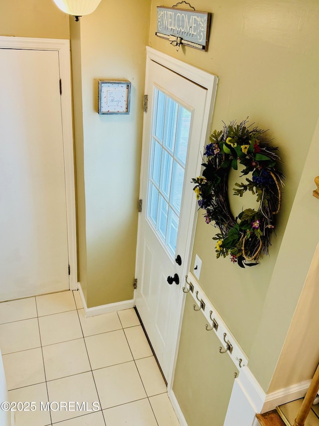 7 Rosewood Dr, Milltown, NJ 08850 - entryway with light tile patterned floors and baseboards