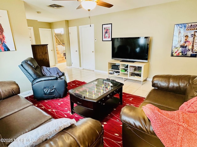 7 Rosewood Dr, Milltown, NJ 08850 - tiled living area with ceiling fan, stairs, and baseboards