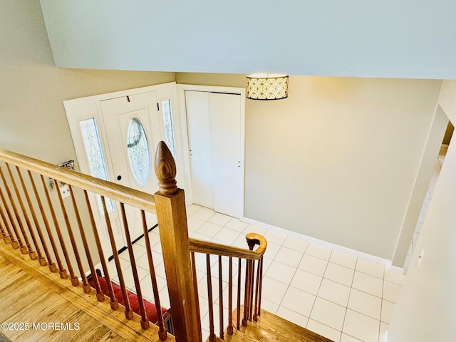 7 Rosewood Dr, Milltown, NJ 08850 - stairway featuring tile patterned flooring and baseboards