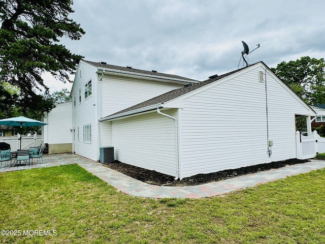 7 Rosewood Dr, Milltown, NJ 08850 - view of home's exterior featuring a patio and central AC unit
