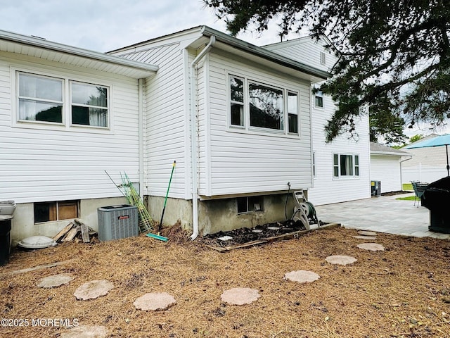 7 Rosewood Dr, Milltown, NJ 08850 - view of property exterior with a patio and central AC