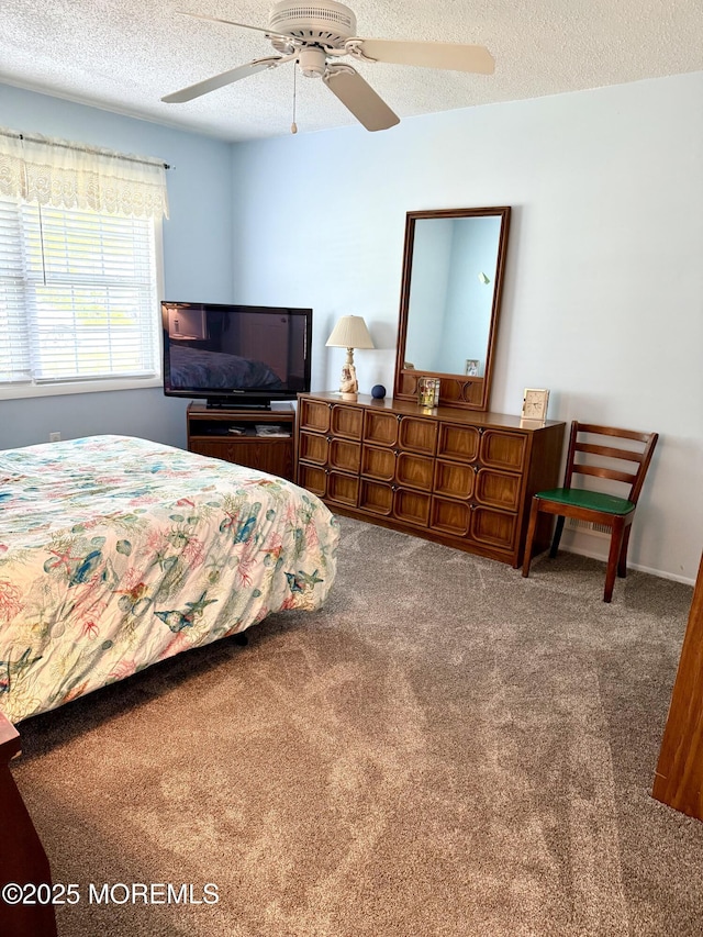 132 Seaview Ave, Brick, NJ 08723 - carpeted bedroom with a textured ceiling and ceiling fan