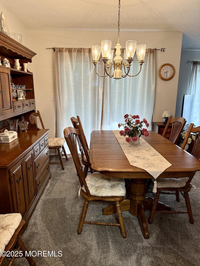 132 Seaview Ave, Brick, NJ 08723 - dining space with dark carpet, a textured ceiling, and a chandelier