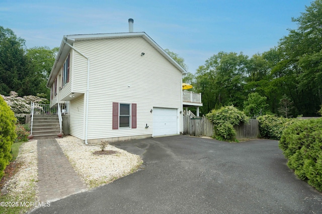 817 Wright Debow Rd, Jackson, NJ 08527 - view of property exterior featuring asphalt driveway, a garage, and stairs