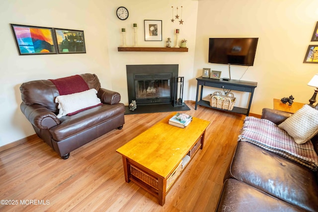 817 Wright Debow Rd, Jackson, NJ 08527 - living room with wood finished floors and a fireplace with flush hearth