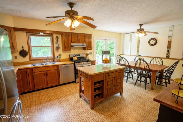 817 Wright Debow Rd, Jackson, NJ 08527 - kitchen featuring stainless steel appliances, a sink, ceiling fan, a textured ceiling, and under cabinet range hood