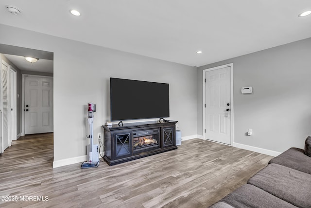 120 Lake Winnepesaukee Dr, Little Egg Harbor, NJ 08087 - living area with wood finished floors, baseboards, and recessed lighting