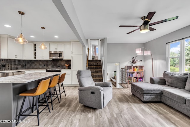 120 Lake Winnepesaukee Dr, Little Egg Harbor, NJ 08087 - living room featuring stairs, light wood-type flooring, ceiling fan, and recessed lighting