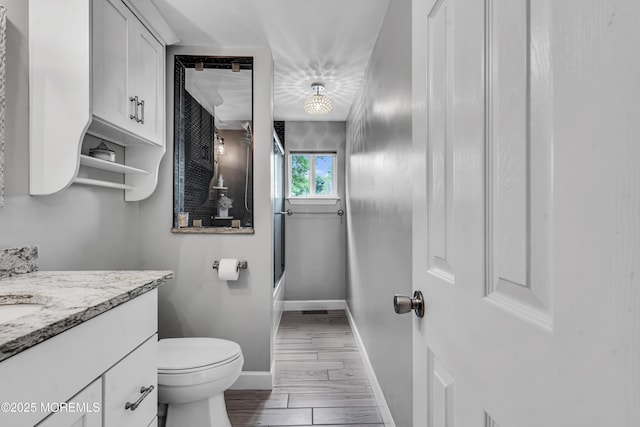 120 Lake Winnepesaukee Dr, Little Egg Harbor, NJ 08087 - bathroom featuring vanity, baseboards, and toilet