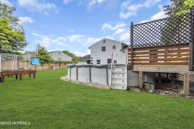 120 Lake Winnepesaukee Dr, Little Egg Harbor, NJ 08087 - view of yard with a deck and a playground