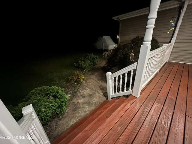 10 Hillside Ave, Tuckerton, NJ 08087 - deck at twilight featuring a porch