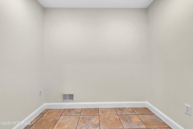 352 Leesville Rd, Jackson, NJ 08527 - empty room featuring baseboards and stone tile flooring