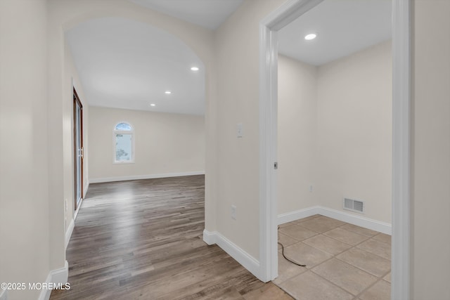 352 Leesville Rd, Jackson, NJ 08527 - hallway with arched walkways, recessed lighting, baseboards, and wood finished floors