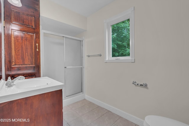 352 Leesville Rd, Jackson, NJ 08527 - bathroom with a shower stall, baseboards, tile patterned flooring, and toilet