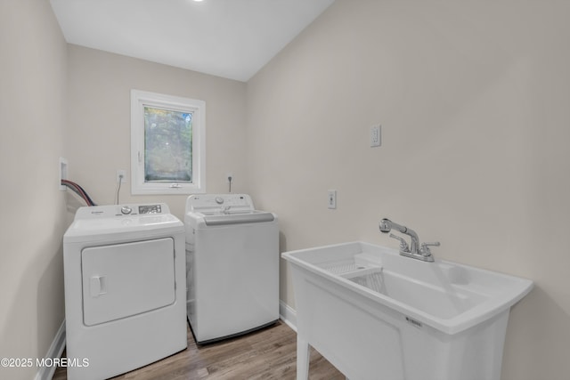 352 Leesville Rd, Jackson, NJ 08527 - washroom featuring washing machine and dryer, light wood-style floors, and baseboards