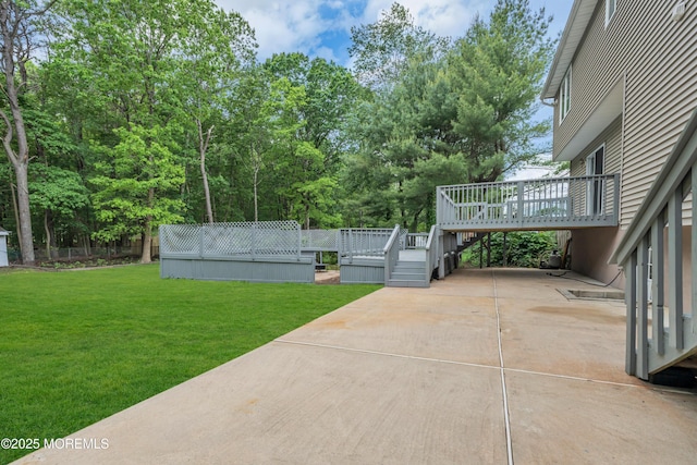 352 Leesville Rd, Jackson, NJ 08527 - view of green lawn featuring a deck, a patio area, and driveway