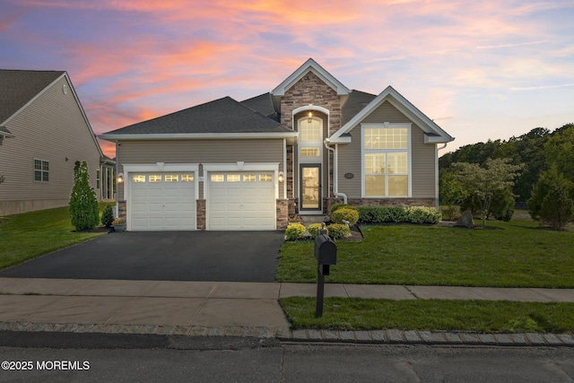 2 Haley Cir, Barnegat, NJ 08005 - traditional-style home featuring stone siding, asphalt driveway, an attached garage, and a front yard