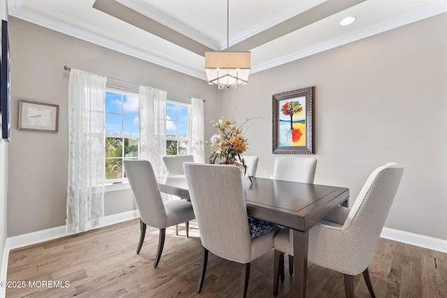 2 Haley Cir, Barnegat, NJ 08005 - dining space with ornamental molding, wood finished floors, baseboards, a raised ceiling, and a chandelier