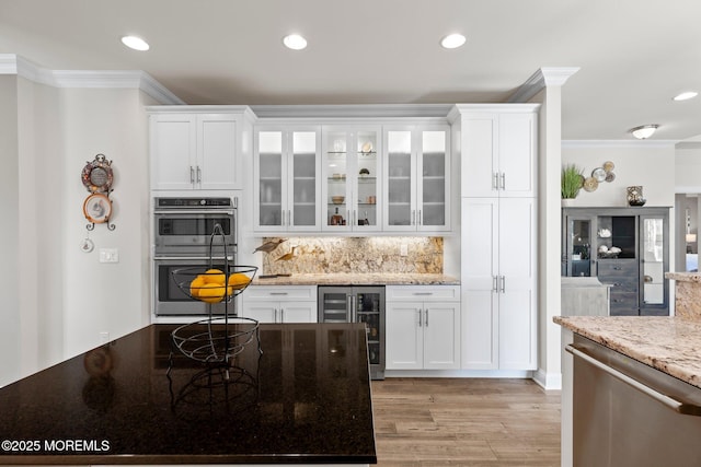 2 Haley Cir, Barnegat, NJ 08005 - bar with wine cooler, ornamental molding, stainless steel appliances, light wood-style floors, and backsplash