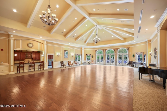 2 Haley Cir, Barnegat, NJ 08005 - workout room featuring a chandelier, high vaulted ceiling, a decorative wall, and recessed lighting