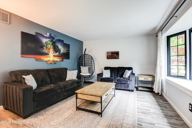 25 Merritt Ter, Matawan, NJ 07747 - living room featuring wood finished floors and baseboards
