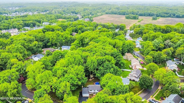 25 Merritt Ter, Matawan, NJ 07747 - aerial perspective of suburban area featuring a heavily wooded area