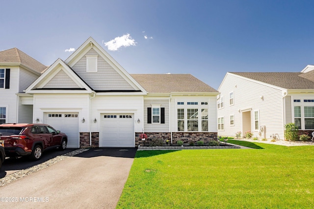 21 Gulfstream Rd, New Egypt, NJ 08533 - view of front of home featuring driveway, a garage, a front lawn, and stone siding