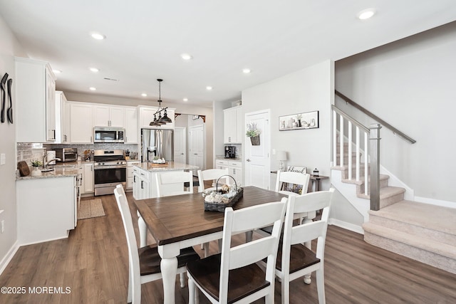 21 Gulfstream Rd, New Egypt, NJ 08533 - dining room with dark wood-style floors, stairway, recessed lighting, and baseboards