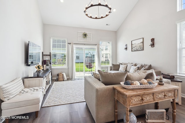 21 Gulfstream Rd, New Egypt, NJ 08533 - living area with a chandelier, high vaulted ceiling, wood finished floors, healthy amount of natural light, and baseboards