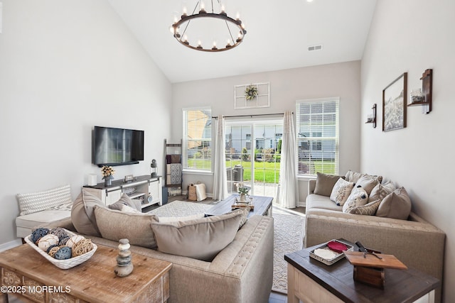 21 Gulfstream Rd, New Egypt, NJ 08533 - living area with a chandelier, plenty of natural light, lofted ceiling, and baseboards