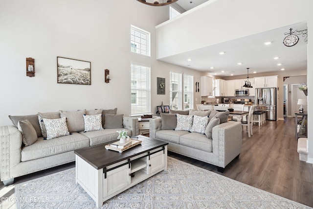 21 Gulfstream Rd, New Egypt, NJ 08533 - living room featuring wood finished floors, recessed lighting, and a towering ceiling