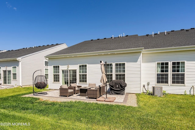 21 Gulfstream Rd, New Egypt, NJ 08533 - back of property featuring an outdoor living space, a patio area, a yard, and a shingled roof