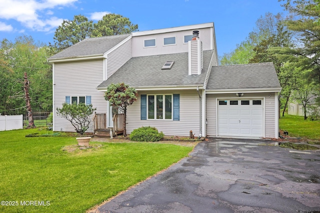 639 Eltone Rd, Jackson, NJ 08527 - view of front facade featuring a garage, roof with shingles, and asphalt driveway