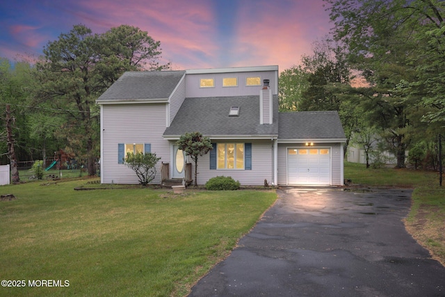 639 Eltone Rd, Jackson, NJ 08527 - view of front facade with a garage, driveway, a front lawn, and roof with shingles