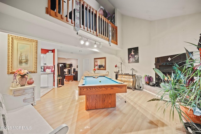 639 Eltone Rd, Jackson, NJ 08527 - rec room with track lighting, billiards, light wood-style flooring, and a towering ceiling
