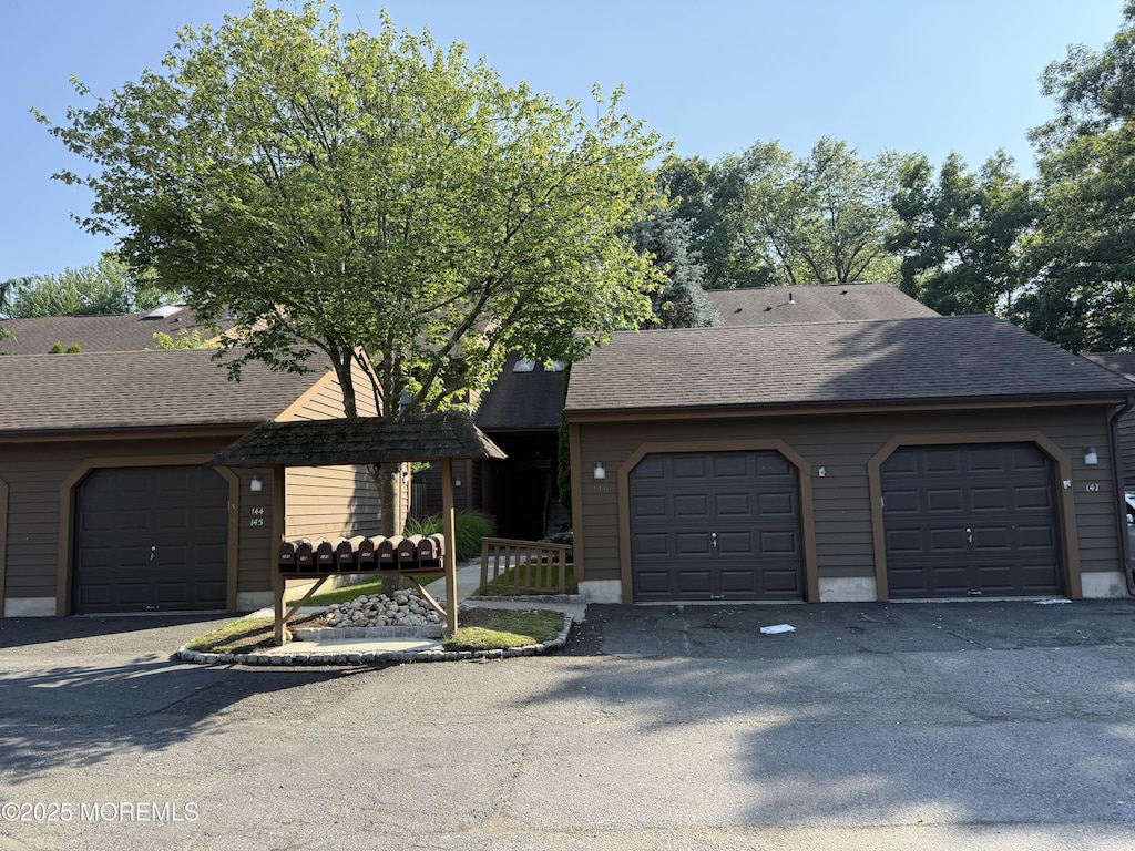 145 Maplewood Ct Unit 145, Edison, NJ 08820 - view of front of house with a shingled roof