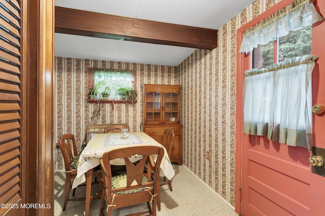 30 Balloch Pl, Red Bank, NJ 07701 - dining space with wallpapered walls, plenty of natural light, beam ceiling, and baseboards