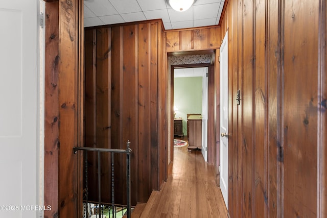 30 Balloch Pl, Red Bank, NJ 07701 - hall with wooden walls and light wood finished floors