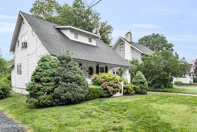 30 Balloch Pl, Red Bank, NJ 07701 - view of front of property with a front lawn, a shingled roof, and a chimney