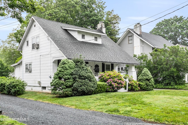 30 Balloch Pl, Red Bank, NJ 07701 - view of front of property featuring roof with shingles, a front yard, a chimney, and cooling unit
