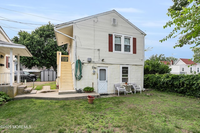 289 Port Monmouth Rd, North Middletown, NJ 07748 - back of property with stairway and a yard