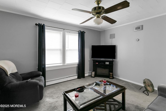 289 Port Monmouth Rd, North Middletown, NJ 07748 - living area featuring carpet floors, a baseboard heating unit, crown molding, a ceiling fan, and baseboards