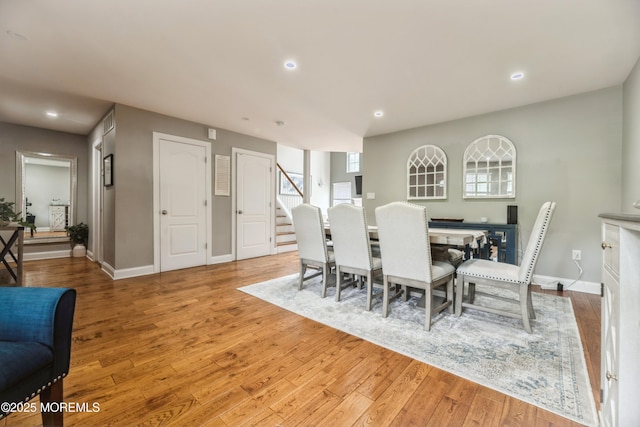 40 Dickerson Ln, Old Bridge, NJ 08857 - dining area featuring light wood-type flooring, stairs, baseboards, recessed lighting, and healthy amount of natural light