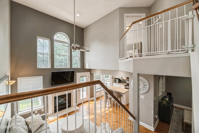 40 Dickerson Ln, Old Bridge, NJ 08857 - staircase featuring a towering ceiling, wood finished floors, healthy amount of natural light, ceiling fan, and recessed lighting