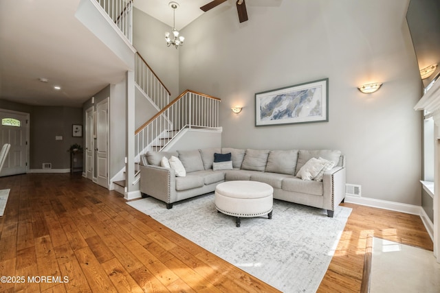 40 Dickerson Ln, Old Bridge, NJ 08857 - living area featuring hardwood / wood-style floors, stairway, a high ceiling, a ceiling fan, and baseboards