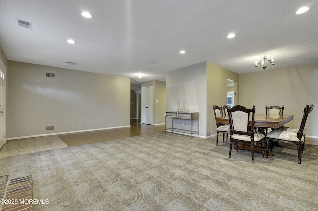 1299 E County Line Rd, Lakewood, NJ 08701 - dining space featuring carpet floors, baseboards, recessed lighting, a textured ceiling, and a chandelier